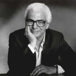 A black and white portrait photo of Barry Cryer